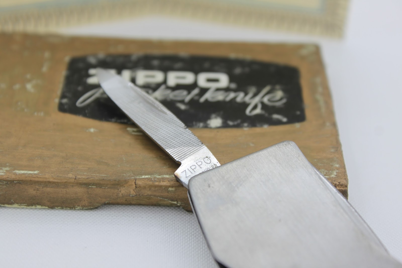 ziq ZIPPO collections ORIGINAL ZIPPO VINTAGE POCKET KNIFE CODE 2002