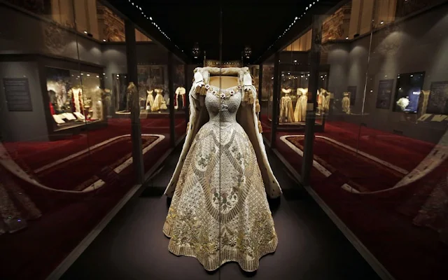 The Queen's Coronation has been brought to life by a major new exhibition showcasing the ceremony's fabulous dresses and artefacts - and private home movies. The dazzling coronation dress the Queen wore for the ceremony is the centrepiece of the exhibition marking the historic event's 60th anniversary.