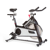 Spinner S5 Indoor Cycling Bike, spin bike with 31 lb perimeter weighted flywheel, chain drive, friction resistance, micro adjustable resistance, push down brake, 4 way adjustable seat, dual sided pedals