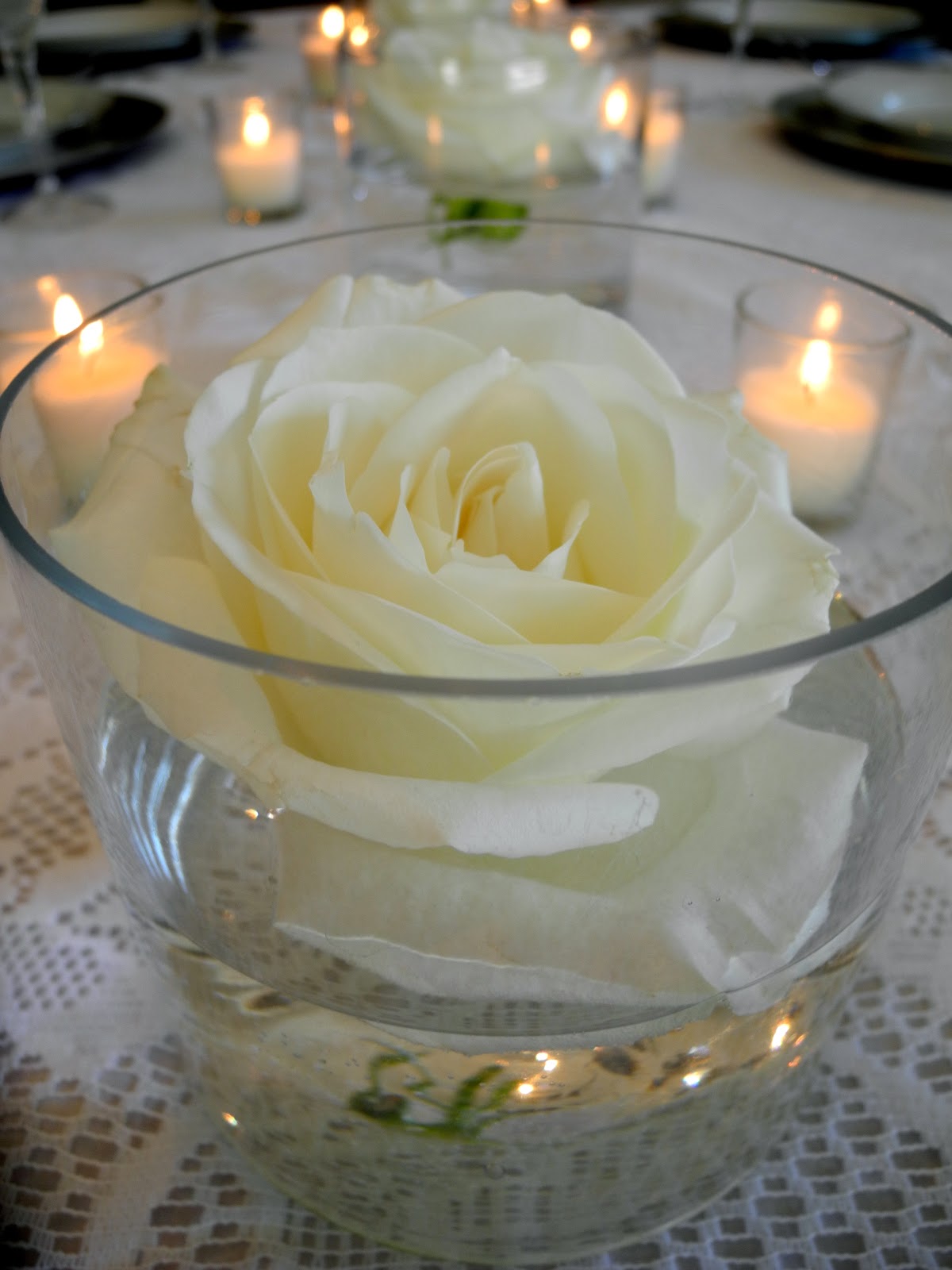 The Flower Girl Blog floating roses an elegant white wedding