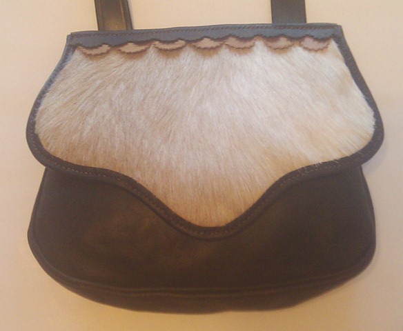 "Ridgemont" pouch with goat hair flap, gusset, roll welted