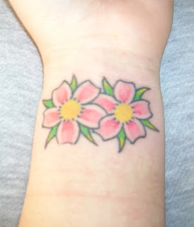 Cool Japanese Cherry Blossom Tattoo On Wrist Picture 7