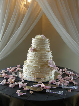 3-tier round fondant frill with gumpaste flowers