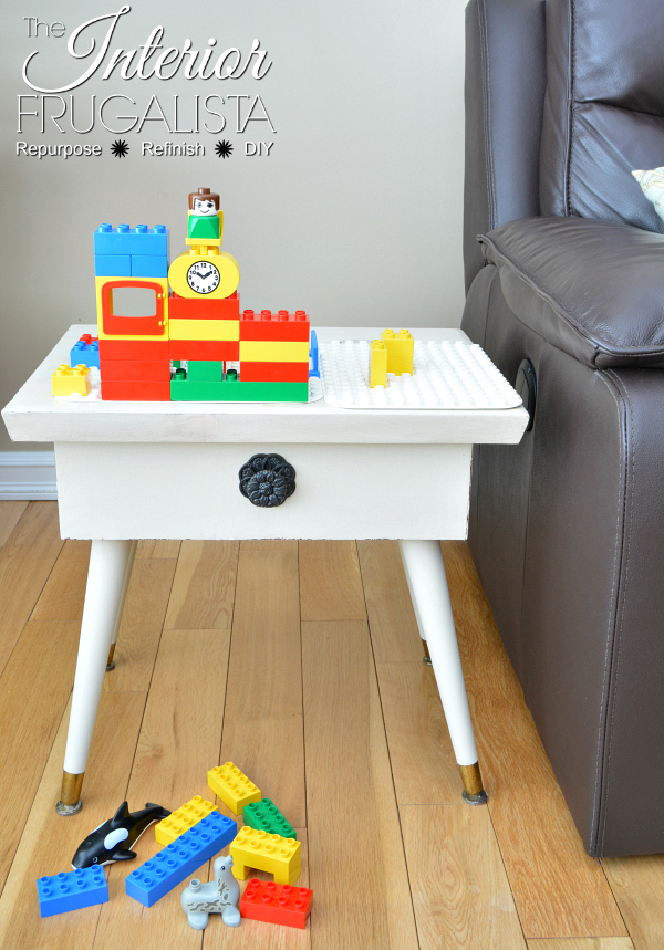 A small vintage wooden hinged top table upcycled for a children's Mega Block Play Table With Storage.