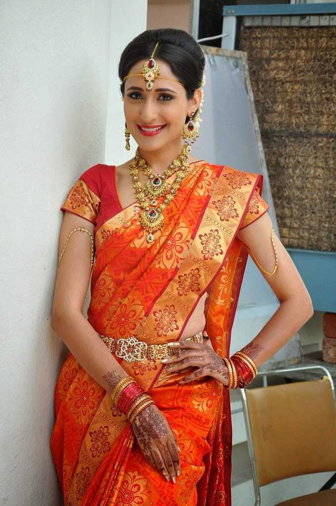 Telugu Actress Pragya Jaiswal Orange Saree Images
