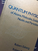 Quantum Physics of Atoms, Molecules, Solids, Nuclei, and Particles, by Eisberg and Resnick, superimposed on Intermediate Physics for Medicine and Biology.