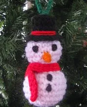 http://www.ravelry.com/patterns/library/snowman-ornament-11
