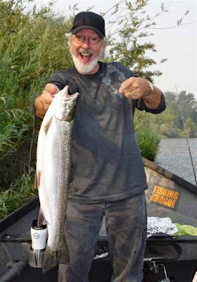 michael-with-a-chrome-rogue-river-summer-steelhead