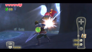 Link fighting monsters in a cave in the early game