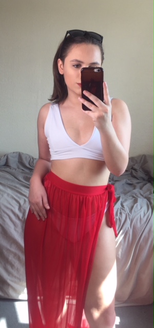 white bikini set with red skirt