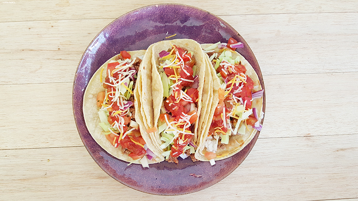 Check out this delicious, Americanized "street taco" recipe - double stacked, over flowing, with a rainbow of veggies, and a dollop of Pace salsa! Make these street tacos in minutes for dinner this evening!