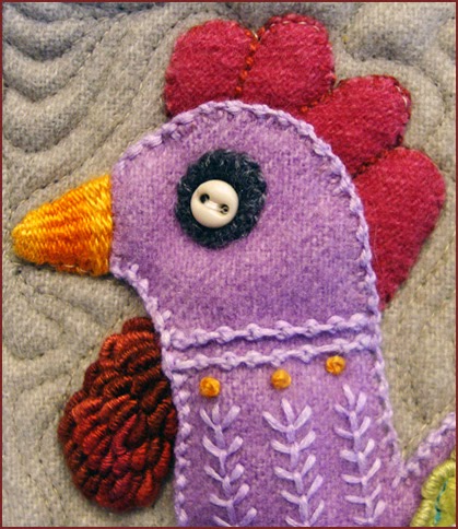 detail from Bird Dance by Sue Spargo, wool applique wall quilt