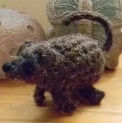 http://www.ravelry.com/patterns/library/tiny-pets--pet-house-toy-bag