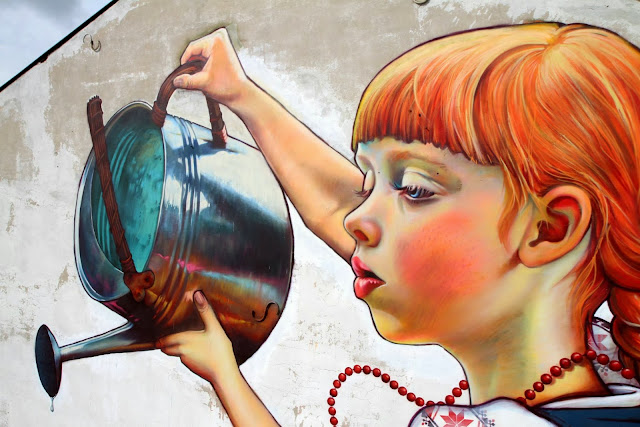 Polish Street Artist Natalia Rak Paints A New Mural On The Streets Of Bialystok For Folk On The Street. 6