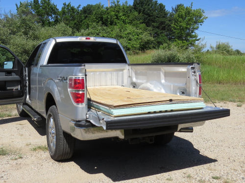 truck with loaded boards