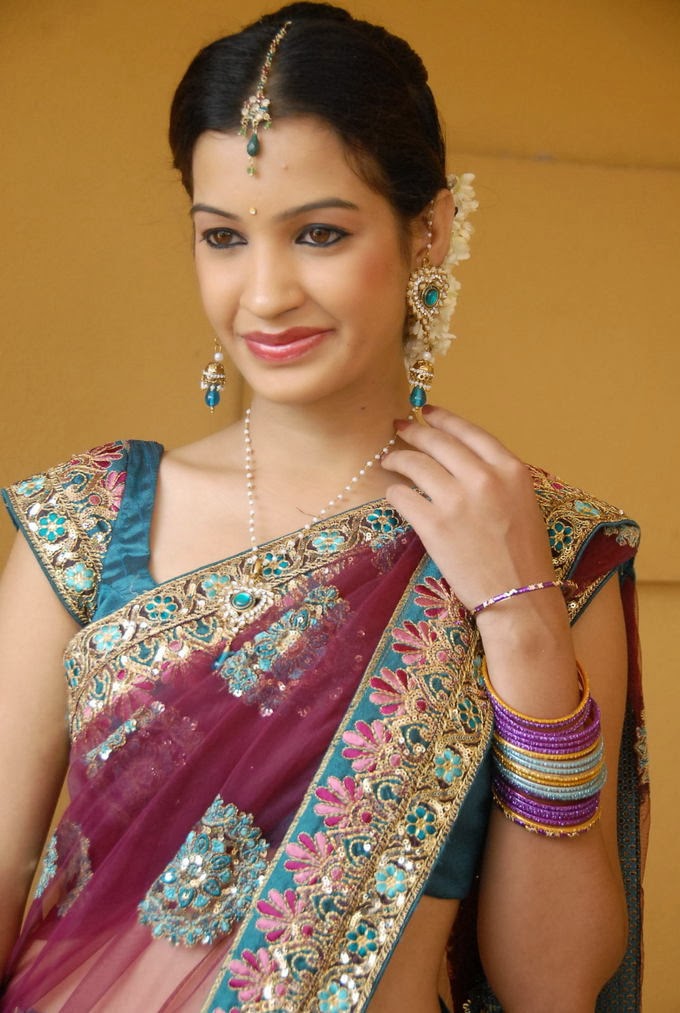 Telugu Heroines Diksha Panth In colorful Net Half Saree Photos Picture Gall...