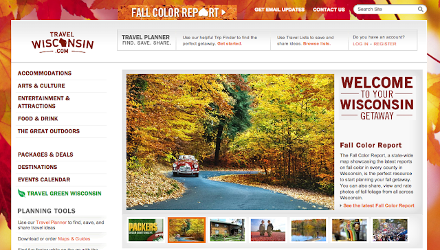Captura de pantalla de la web con la imagen de un coche rojo en una carretera en otoño