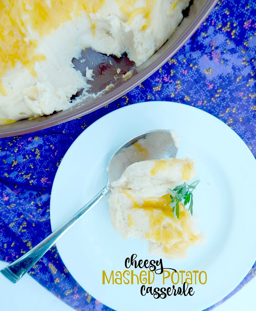 Cheesy Mashed Potato Casserole...an ideal Thanksgiving side dish!  Cheesy and rich this dish can be prepped up to 3 days ahead for that busy holiday.  A family favorite! (sweetandsavoryfood.com)