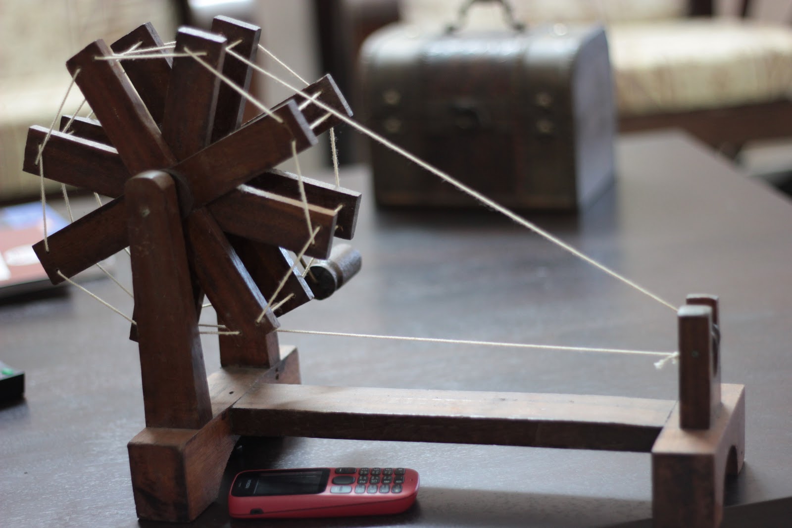 229 See, try and buy one charka (spinning wheel), which is the symbol