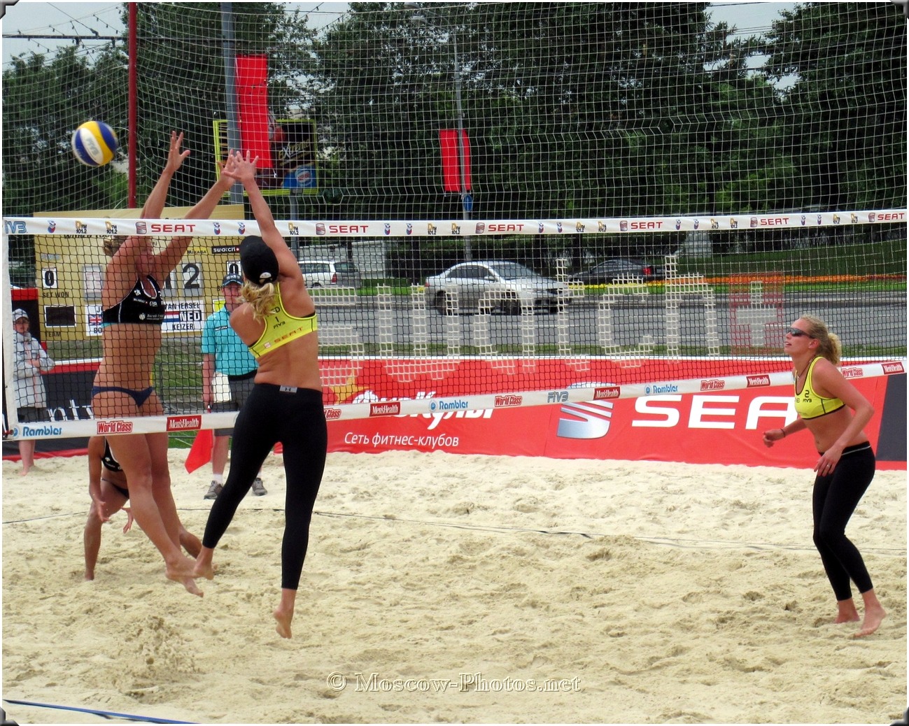 BEACH VOLLEYBALL SPIKE AGAINST THE BLOCK