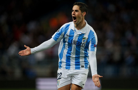 Málaga midfielder Isco celebrates after scoring his team's opener against Porto