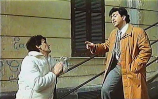 Massimo Troisi (left) and Lello Arena in the staircase scene from Troisi's second film, Scusate il ritardo