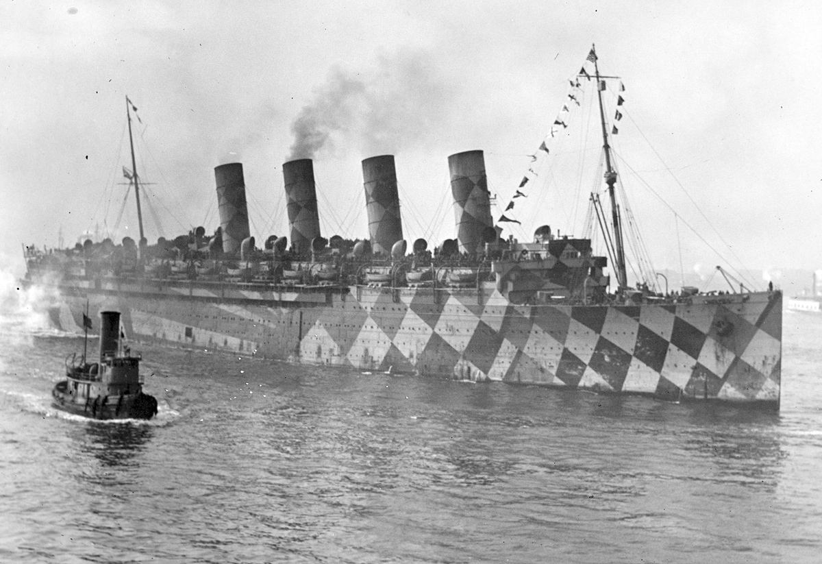 The RMS Mauretania in an American port with dazzle camouflage.