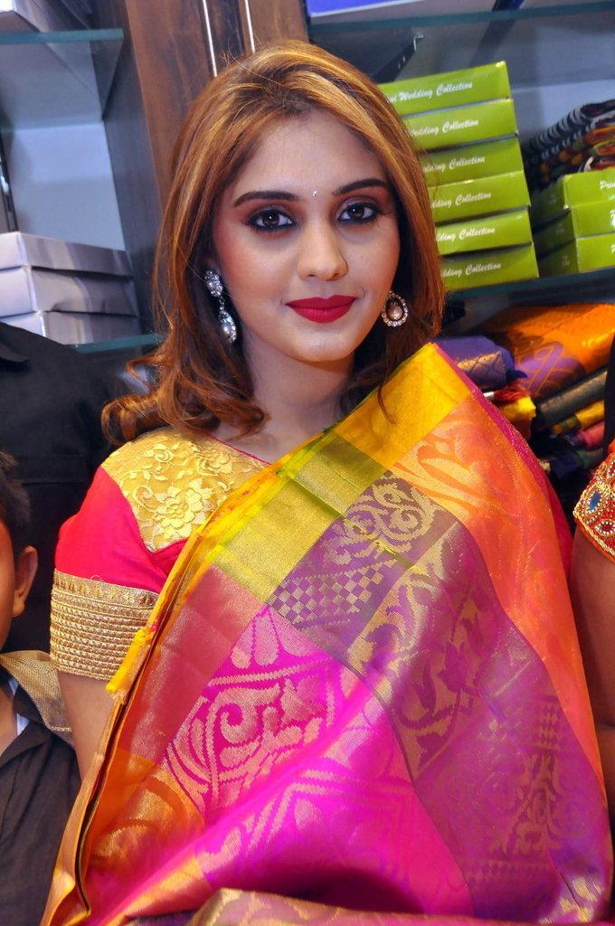 Surabhi Stills In Orange Saree At Fashion Store Launch