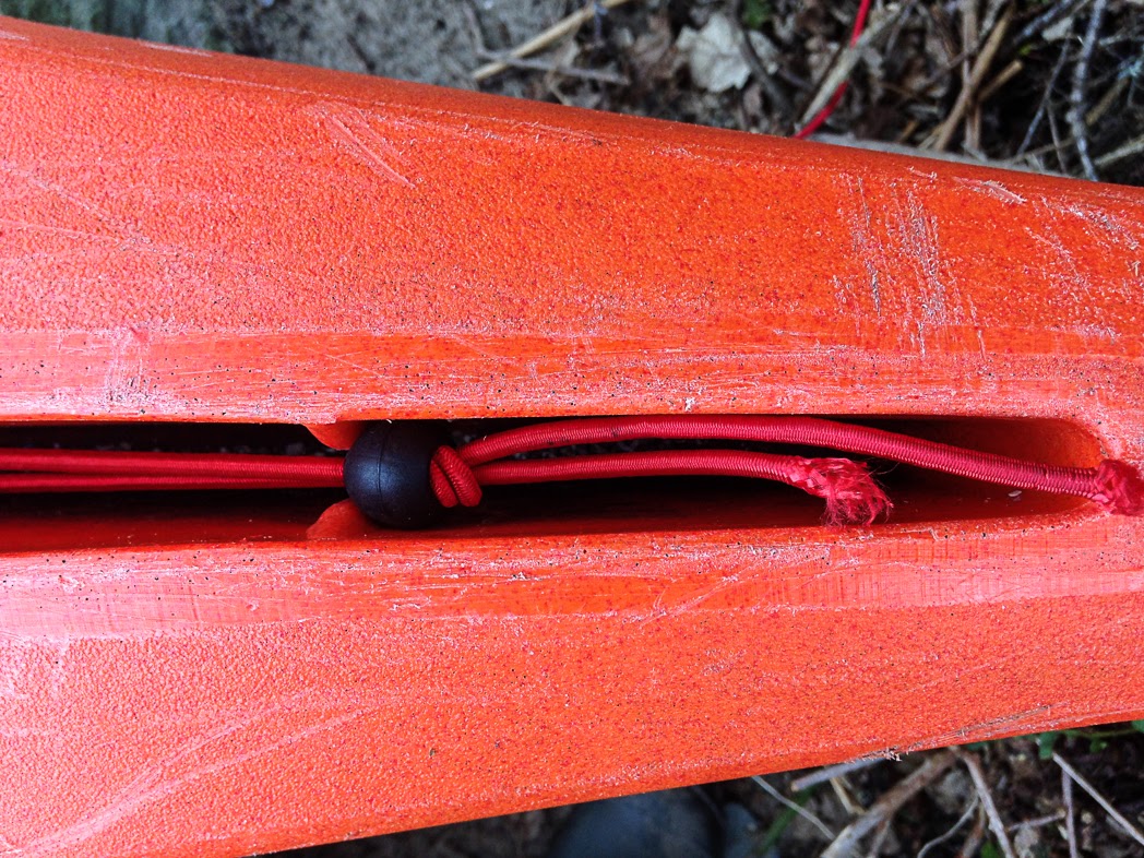 Sea kayaking with Replacing the downhaul elastic on