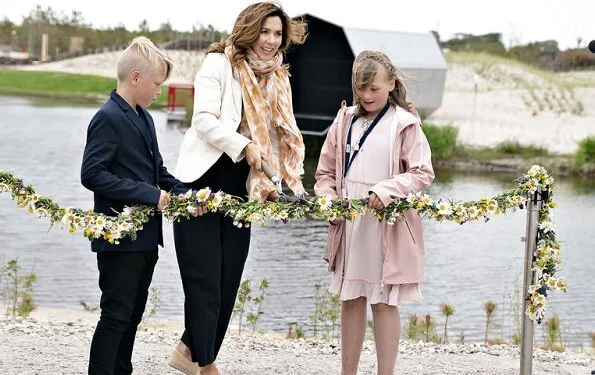 Crown Princess Mary wore Chanel black and cream espadrilles flats. Princess wore an ivory blazer and navy trousers