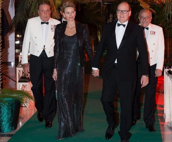 Princess Charlene wore Ralph Lauren gown from 2018 collection and she wore Ralph Lauren black leather jacket from Fall 2017 collection