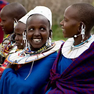 Maasai villagers in traditional clothing and jewelry in the Serengeti National Park, Tanzania