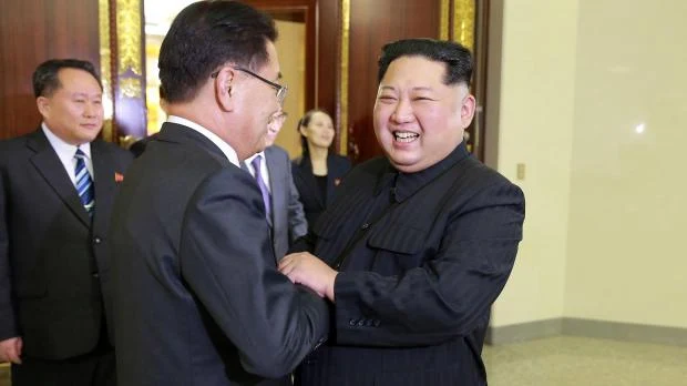 Image Attribute: North Korean leader Kim Jong Un greets a member of the special delegation of South Korea's President at a dinner in this photo released by North Korea's Korean Central News Agency (KCNA) on March 6, 2018. KCNA/via Reuters 