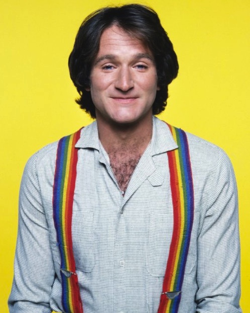 Robin Williams as Mork