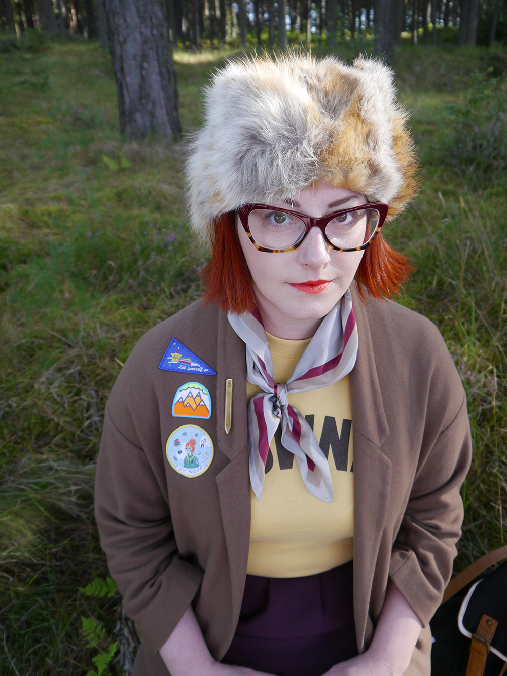 Scottish blogger, style blogger, Moonrise Kingdom outfit, Moonrise Kingdom style, costume idea, Wes Anderson inspired outfit, Sam Moonrise Kingdom, scout style, Moonrise kingdom inspired outfit, vintage style, fur hat, Spex Pistols glasses, patches for adventurers, Lucky Dip Club patches, Olivia Mew cat scarf, vintage Brownies tshirt, Rag Trade Vintage, primark backpack, adventurer style