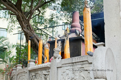 Devotees burning incense sticks at AMA Temple, Barra square