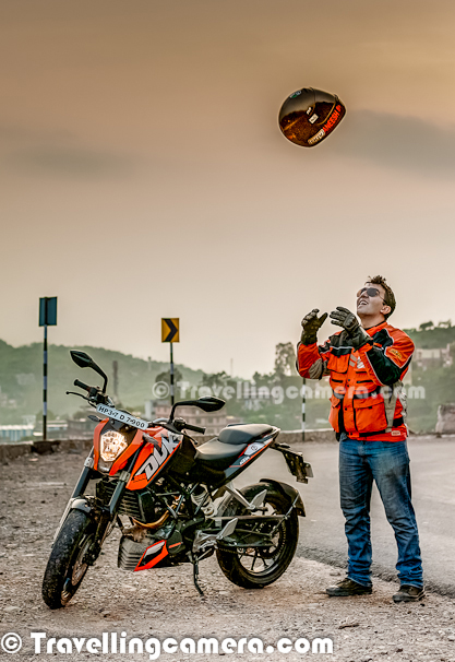 This Photo Journey shares some of the photographs of Himachal's first BAJAJ KTM DUKE200 and it's proud owner Mr. Aneesh Airborne Awasthi. If you don't know Aneesh, check out following links before proceeding with the latest Journey - CLIMBING, FALLING, STUMBLING & FALLING on the way to Hatu Peak in snow...Motorbike Stunts by Aneesh...This photograph is clicked at Golf-course of Chandigarh Cantonment area at Chandi Mandir... Before actual shoot, it was a warm up session to have a round inside wonderful Cantonment area and see if we find something interesting by keeping security measures in mind... But finally we moved to the new Himalayan Expressway which bypasses Pinjore, Kalka & Parwanoo to save 1.5 Hrs traffic in these main towns. KTM Duke200 looks amazing in above photograph with lush green golf grounds...Aneesh bought the bike KTM DUKE200 in the month of May after getting it 2 months in advance. Have enjoyed riding her more in mountain's because of her responsive engine. He kept on going to Palampur and Shimla frequently with KTM DUKE200. Most capable bike in its segment KTM is world's best dirt bike manufacturer. Duke is a street bike. KTM is more renowned for its dirt bikes, which have made their name across the globe in race/rally.Aneesh wishes to travel throughout the Trans-Himalayas on KTM DUKE200 and upgrade to bigger version soon. Getting sponsored for any kind of such endure is must and this is something that Aneesh is trying for. KTM DUKE200 is a head turner and attention gainer too. People keep on clicking nd asking about KTM DUKE200 from him...Aneesh also love stunting and this was first time that he was trying his stunts on KTM DUKE200. This is how KTm Website describes KTM Bikes - 'Lightness rediscovered. Maximum riding fun, powerful propulsion and optimum user value thanks to thoroughbred motorcycle technology. Featherweight chassis with high-quality components and first-class brakes. And dynamic cornering fun guaranteed with the surprisingly full-bodied and lively power of the cultivated, new four-stroke single-cylinder with injection, six-speed transmission and low fuel consumption. Precisely what you'd expect from a genuine KTM.''HP 37 D7900' - KTM DUKE200 (This is Aneesh's second vehicle registered with number 7900 in Palampur Town of Himachal Pradesh.KTM Duke 200 is very distinctive and attractive sports bike which carries lots of attitude with it. It has a great charismatic effect which spells bounds the riders with its unmatched appearance and racer look. The front portion of the bike has only cowl which has stylish halogen headlight in it which is very well stacked and looks very elegant. The straight handle bars of the new bike KTM Duke 200 is also very sporty and also very comfortable, specially designed for racing purpose. The stylish turn indicators are placed beneath the front cowl and looks very stylish and unadulterated.KTM DUKE200 appears to be very small and the rider feels that he is riding a mini bike. The distinctive center console may comprise of fuel gauge, speedometer, trip meter, turn indicator signal, etc. The stylish and unmatched fuel tank of the new KTM Duke 200 is also very appealing and has a feel of racer bike in it. The foot pegs available in the bike are very stylish and tuck in neatly when unused. The rear portion of the bike is also very impressive with sweeping style side indicators.Above photograph is shot on Himalayan Expressway, while we were going from Chadigarh to Parwanoo through Pinjore....Kraftfahrzeuge Trunkenpolz Mattighofen – commonly known as KTM, is one of the brilliant Motorbike Manufacturer. KTM is quite focused on their street line-up and that annihilates whatever competition is left on the road. KTM Bikes are edgy, mad, exceptionally capable, thoroughly engineered and fundamentally awesome. KTM has partnered with Bajaj in India and now folks are getting mad to get this machine. One needs to book in advance, to get it after 2 months of booking. KTM Duke 200 is in great demand. KTM DUKE200 is better known as the most potent streetbike to have ever been manufactured in India.After wonderful evening on Himalayan Expressway, it was time to get some quick clicks in hues of Sunset. Although I wish I had reflectors and extra battery with me :)More details about KTM DUKE200 can be checked on their official website at - http://www.ktm.com/naked-bike/200-duke-eu/#.UBJPpaMS6SoIt was time to have some fun after wonderful ride on KTM DUKE200 on Himalayan Expressway. Aneesh, Kshitiz and I thoroughly enjoyed this evening and more photographs are yet to come... This was first time, I was on a superbike with 120+ speed... It was literally flying on Himalayan Expressway, which were facing huge hills covered with clouds... We also shot some videos, which will be available in few days...Here comes Mr. Aneesh Airborne Awashthi !!! ... with his KTM DUKE200 in background... He loves to be on road and walking around the milestones/boards which help him to always do the things right... Aneesh is all set for his Trans-Himalayan Ride on KTM DUKE200 and we wish him best for the same !!!