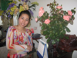 Hien at Hanoi Emerald Hotel with roses