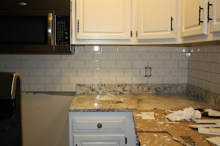 Restored Purpose: Brightening up the Kitchen with Subway Tile!