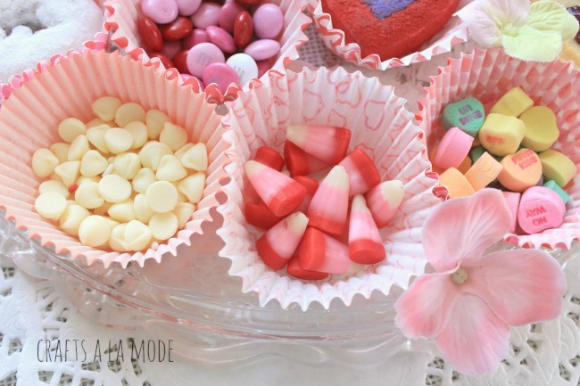 Candy and cookies in Valentine cupcake papers
