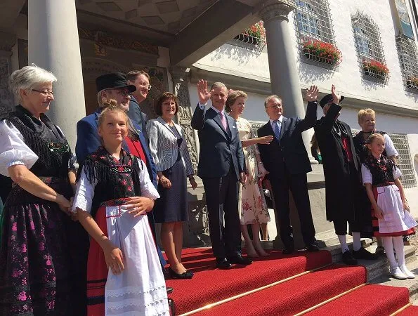 Queen Mathilde wore Giambattista Valli floral print silk chiffon midi dress in Neutrals. Princess Caroline wore same dress