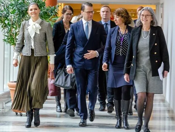 Crown Princess Victoria wore Mayla tweed jacket, H&M pleated midi skirt, and carries Valentino Small chain shoulder bag