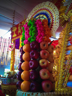 Balinese Wedding Ceremony Offerings With A Pile Of Fruits And Balinese Cakes