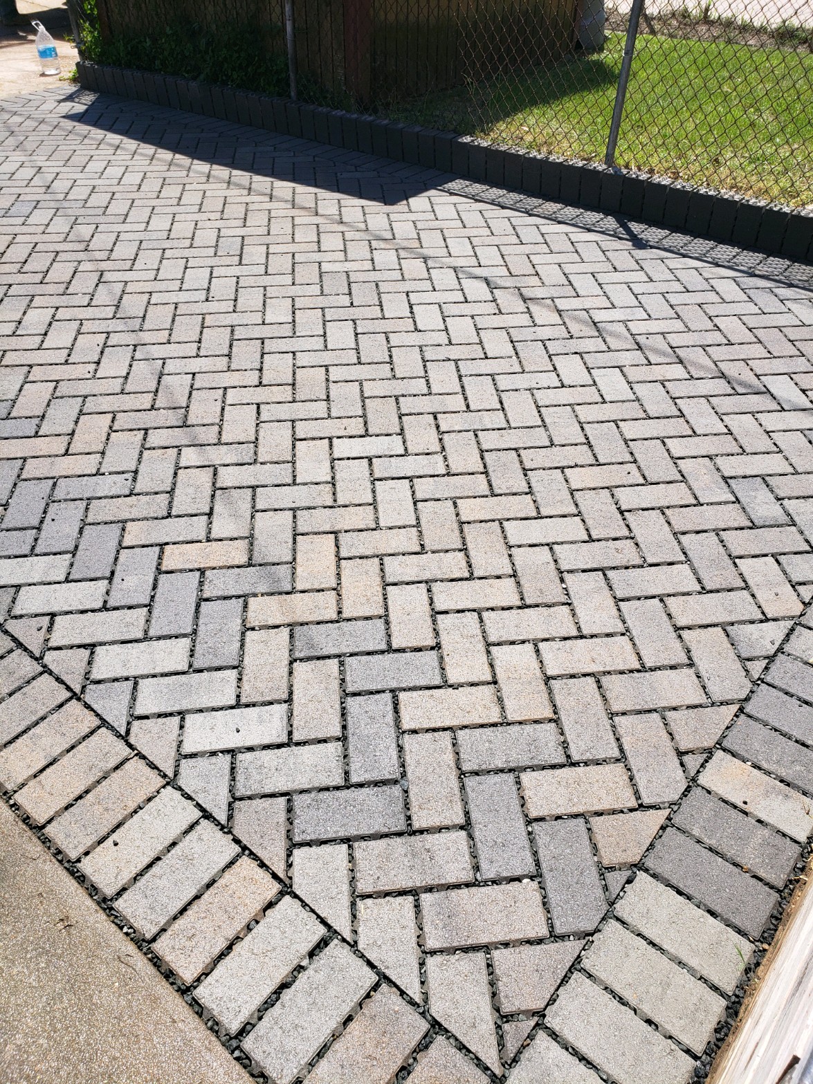Custom Stoneworks & Design Inc. Permeable Paver Driveway Parking Pad in Baltimore