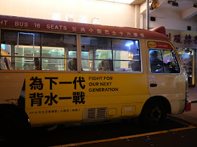 "Fight for our next generation" on a Hong Kong minibus
