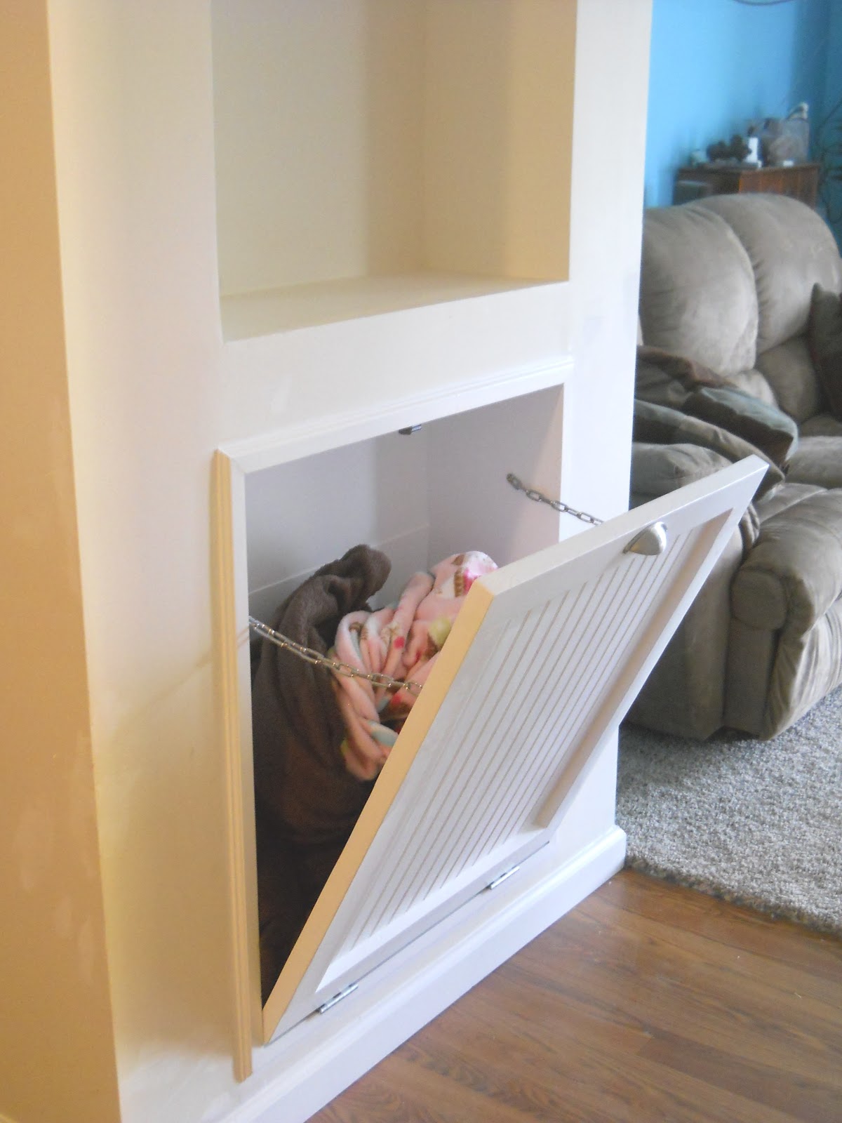 1001 Goals TV Room Hidden Blanket Storage