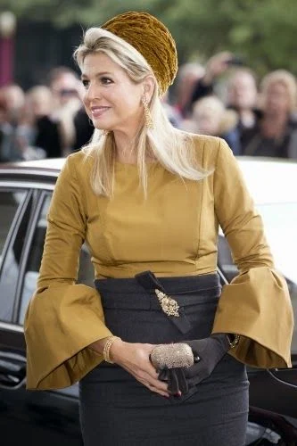 Queen Máxima of The Netherlands attended an exhibition opening in Amsterdam. Style of Queen Maxima