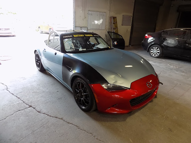 Mazda Miata Race Car prior to body repairs & paint at Almost Everything Auto Body.