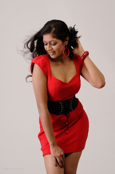 Meghana Raj portfolio Photoshoot in Red Shorts