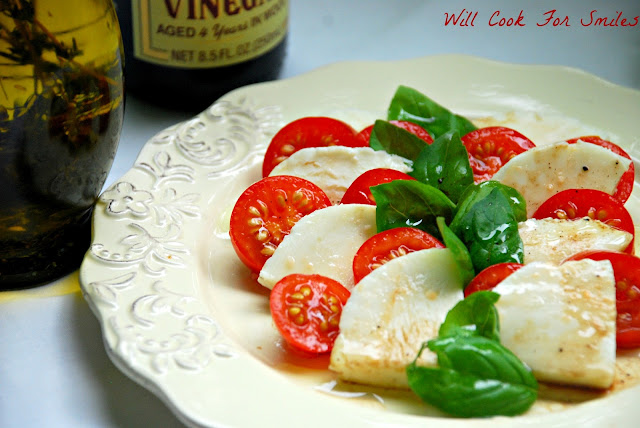 basil, mozzarella cheese, and tomatoes on a plate 